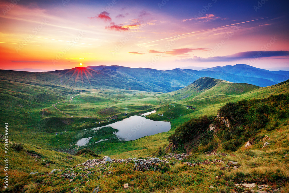 Captivating panoramic view on mountains. Incredible landscape photography, sunrise scene. Location: Svydovets mountain chain system in Ukrainian Carpathian mountains.