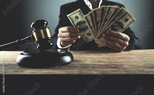 Judge counting dollars. Corruption in justice
