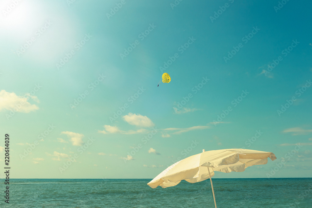 Beach umbrella against the background of the sea.