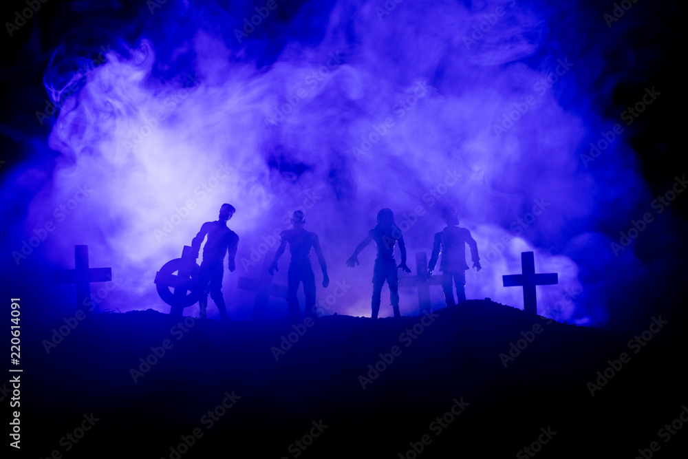 Scary view of zombies at cemetery dead tree, moon, church and spooky cloudy sky with fog, Horror Halloween concept. Scary view of zombies at cemetery dead tree, moon, church and spooky cloudy sky with fog, Horror Halloween concept.