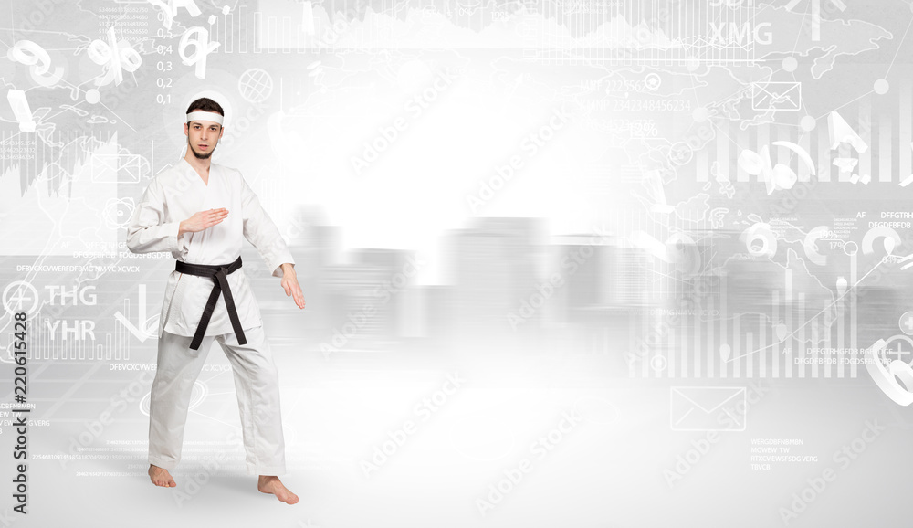 Young karate trainer doing karate tricks on the top of a metropolitan city
Young karate trainer doing karate tricks on the top of a metropolitan city