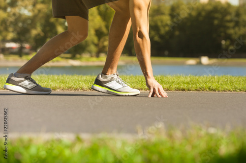 Male runner at start.