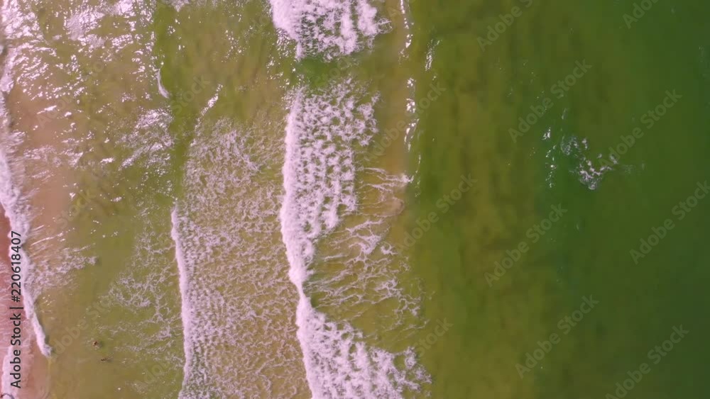 aerial view of seashore with sandy beach