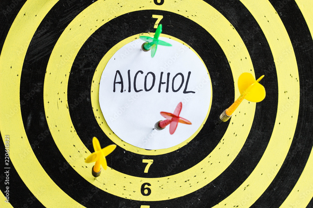 Target with darts in the center of which the inscription alcohol Target with darts in the center of which the inscription alcohol