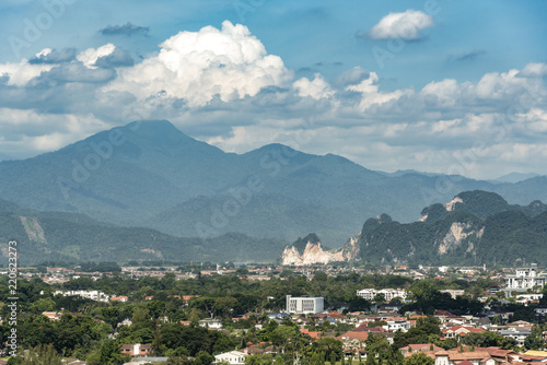 Картината върху платно Early and vivid sunrise on Ipoh hills and Ipoh city, Malaysia