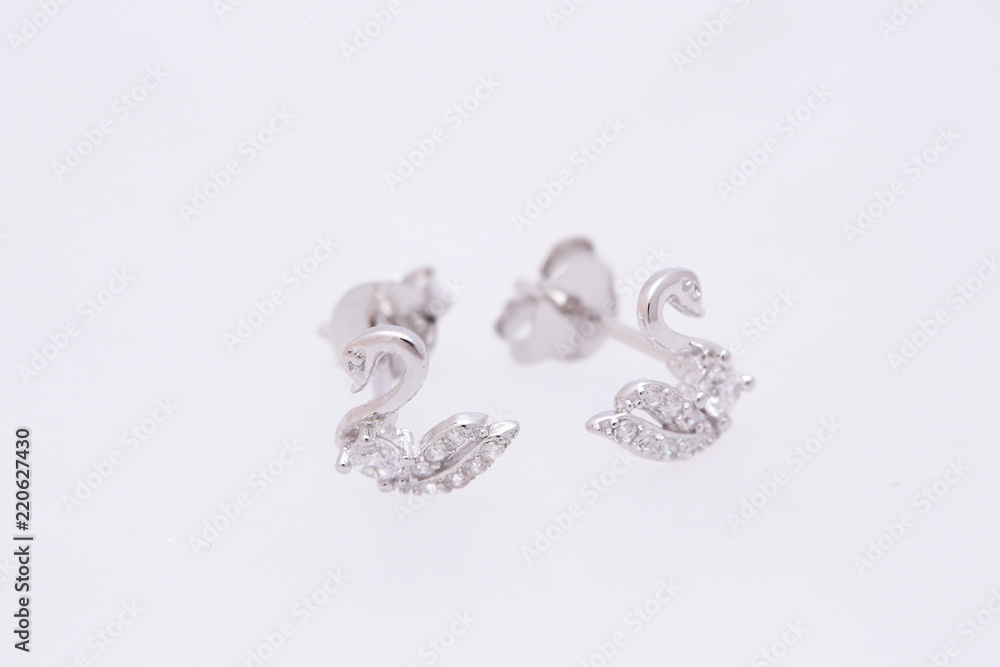Fashion earring on white background Fashion earring on white background