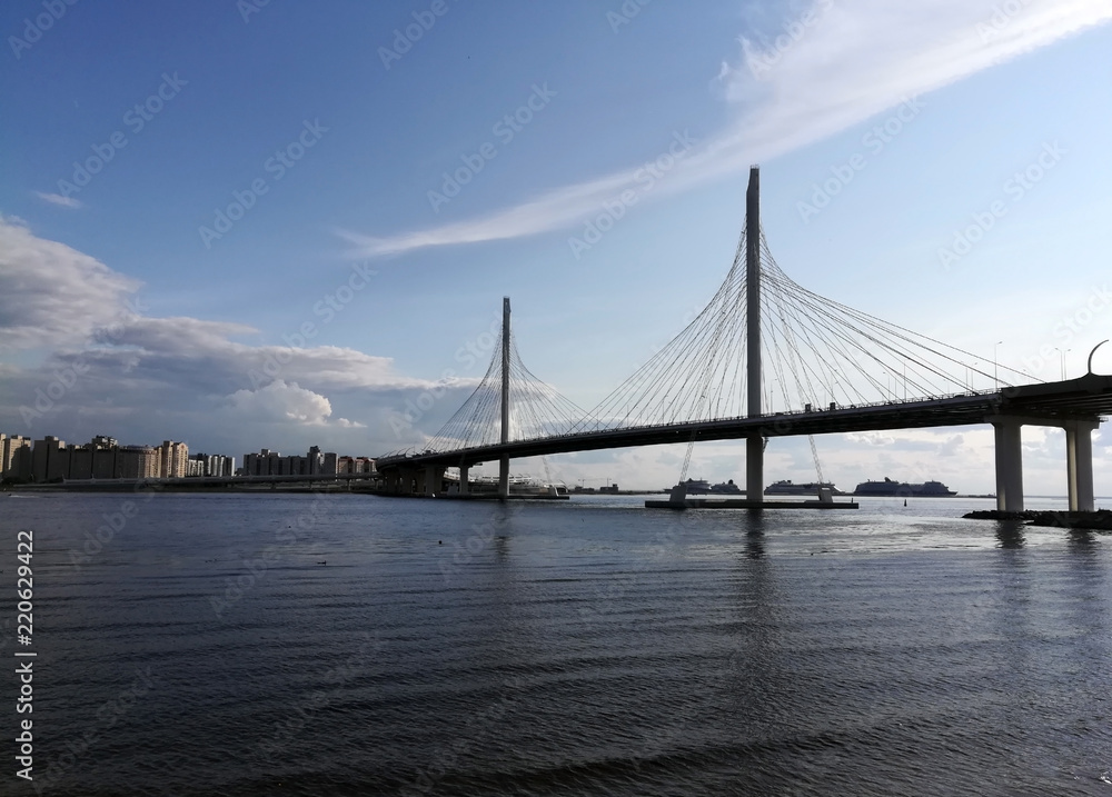 Panorama of the suspension bridge across the River in the city