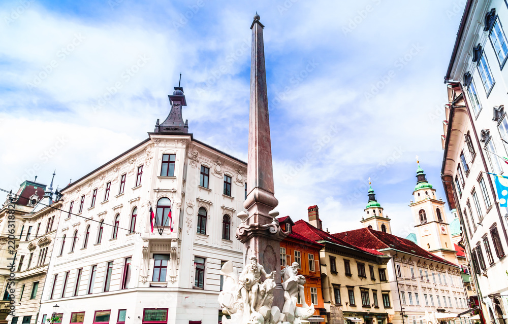 View on histroic buildings and fountain in Ljubljanica - Slovenia