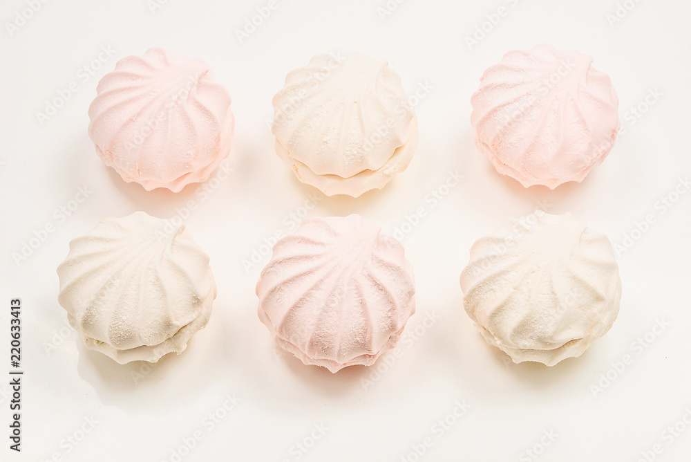 Rose marshmallows on white background. Zephyr. Rose marshmallows on white background. Zephyr.