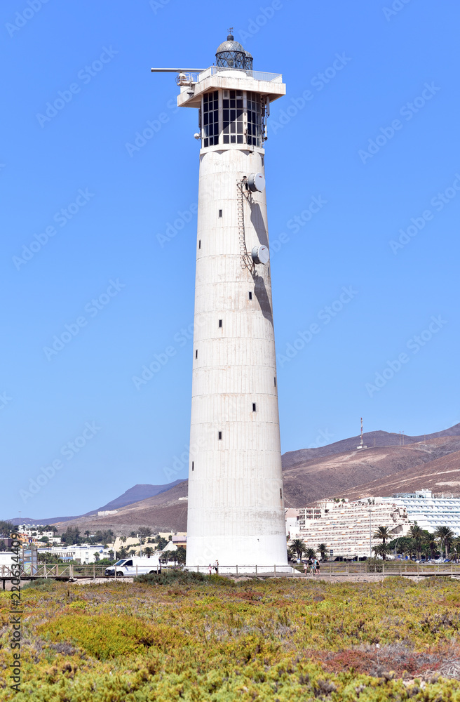 Lighthouse on Morro Jable beach on Jandia peninsula in sunrise light, Fuerteventura, Canary Islands, Spain