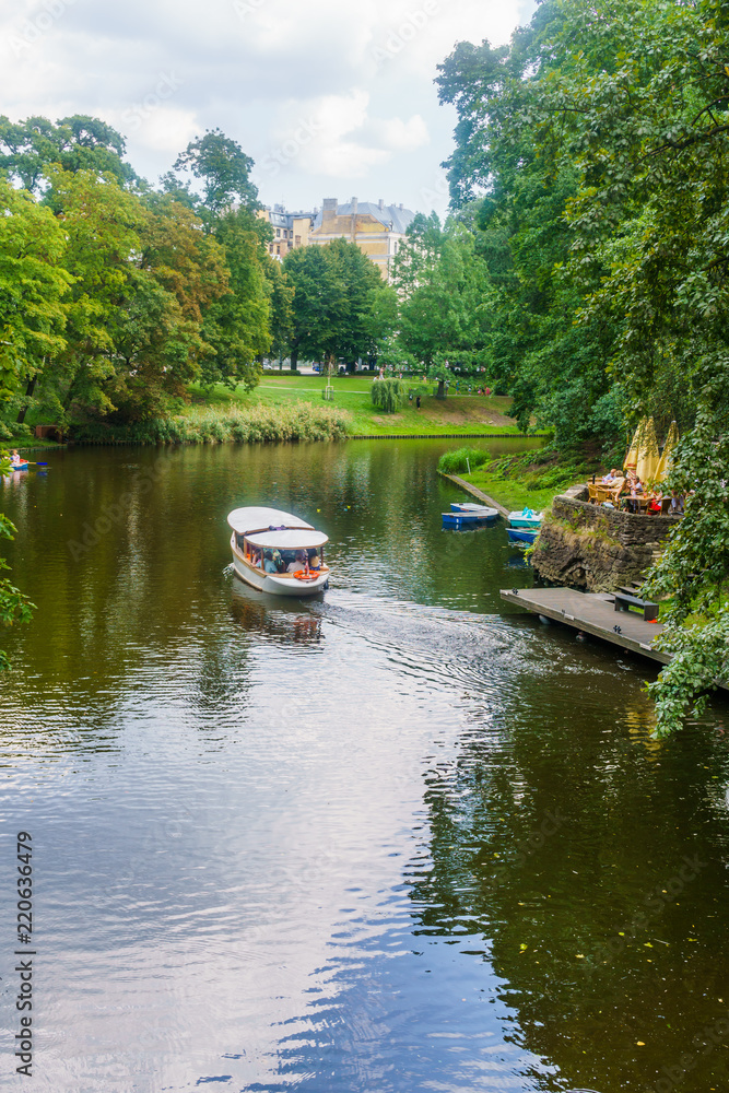 18.08. 2018 The Kronvalds Park, Riga, Latvia. Urban park with a canal, seasonal boating, plus paths, fountains. One of the most favorite recreation places of Riga. Sightseeing in Riga.
