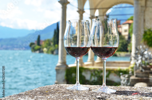 Two wineglasses. Varenna town at the lake Como, Italy