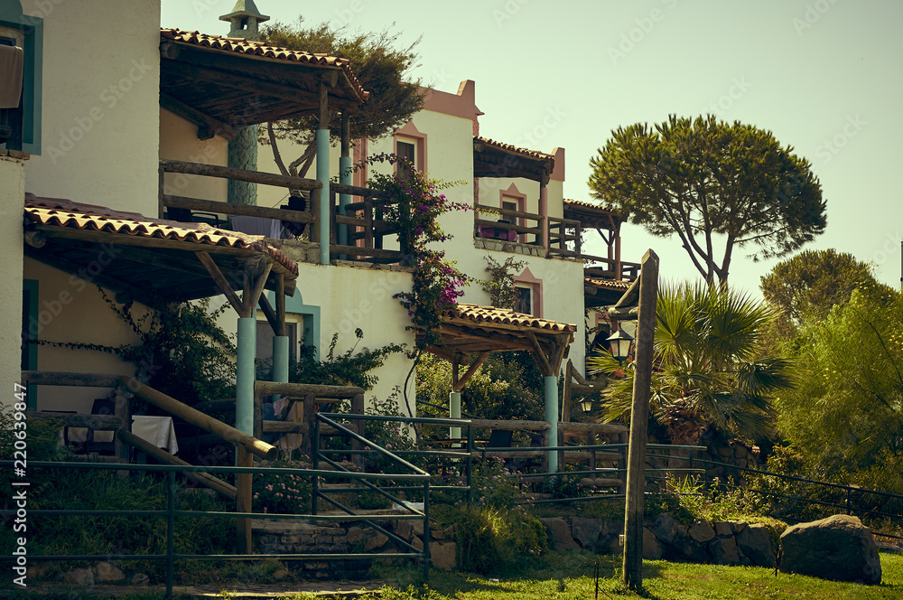 Fototapeta premium Traditional White houses on the slopes of the mountains, the coast of the Aegean Sea of Turkey. Turgutreis , Bodrum.