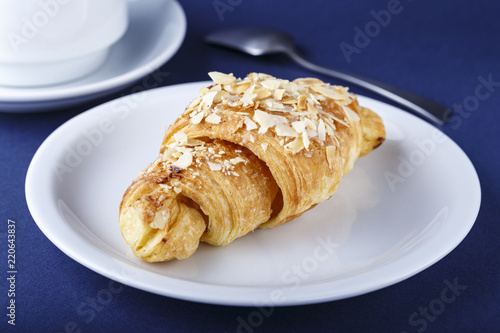 croissant on a plate on a table