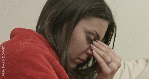 Woman heaving sinus pain.