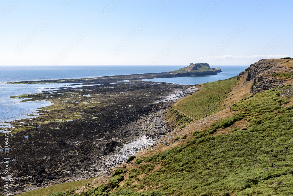 Worms Head, from the Wales Coastal Path. Worms Head is located on the Gower peninsular, South Wales, and can only be reached at low tide
