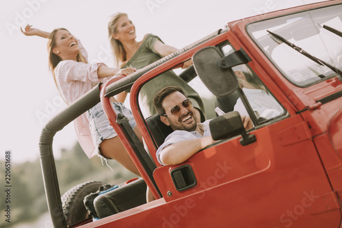 Group of young happy people...
