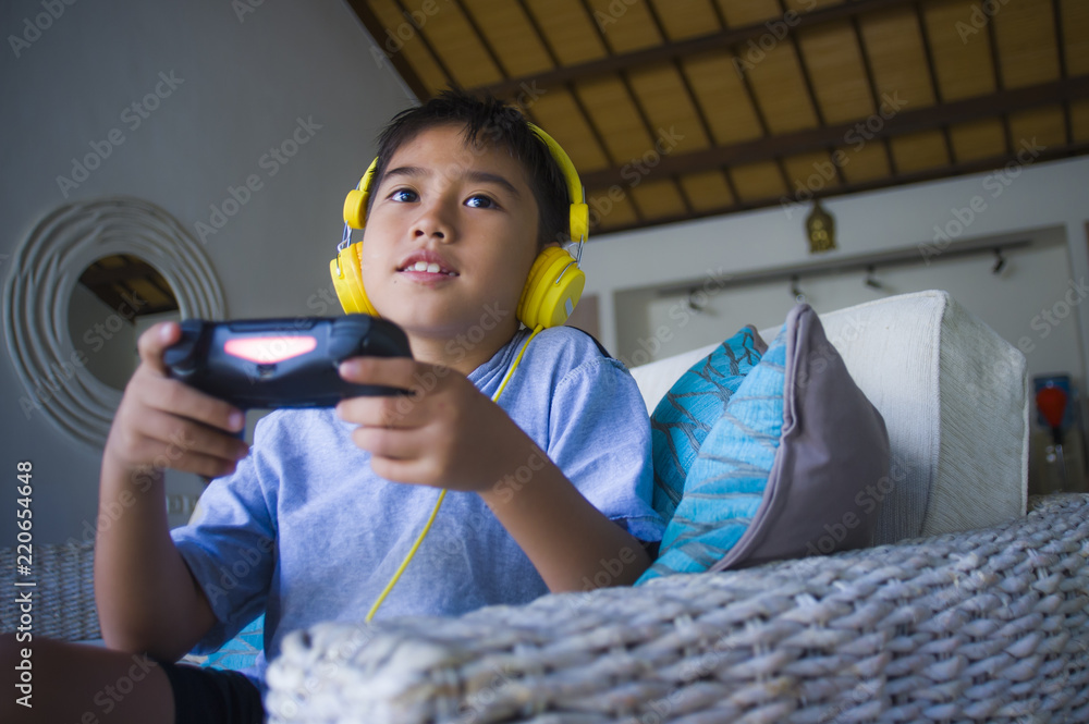 Boys are enjoying playing online games in their mobile phones