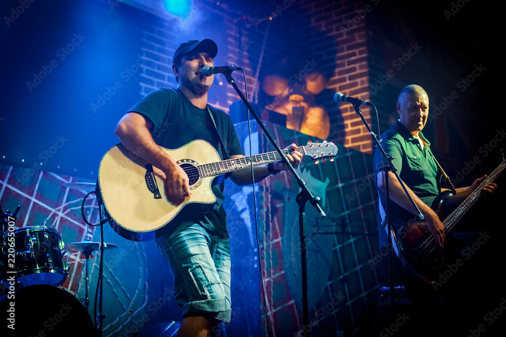 Fototapeta premium Band performs on stage in a nightclub