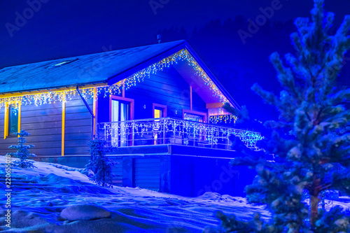 Cottage in winter. Christma...