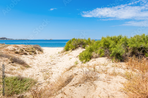 Sand dunes and sea in summer day on Naxos island  Greece