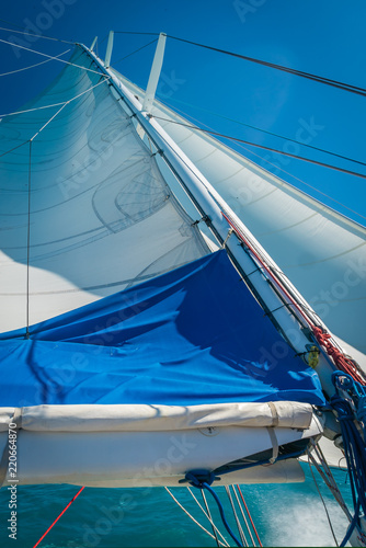 фотографія Sail of a large monohull boat under strong wind