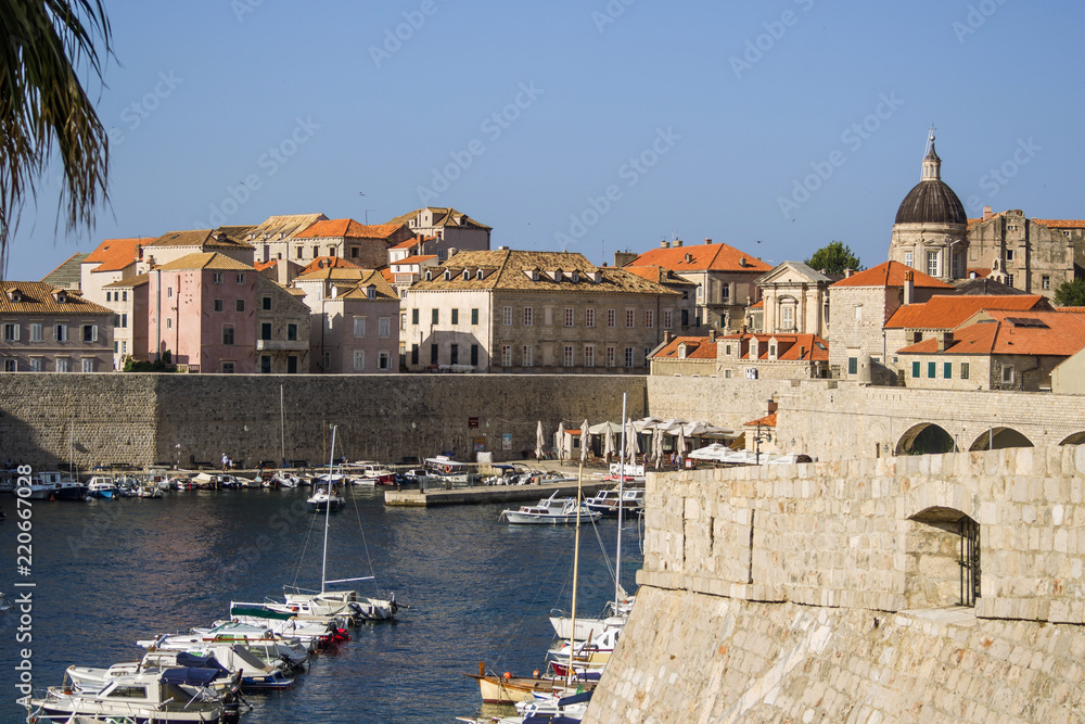 Croatia. Dubrovnik - July 22, 2018. Overview to the old town and the berth with the ships