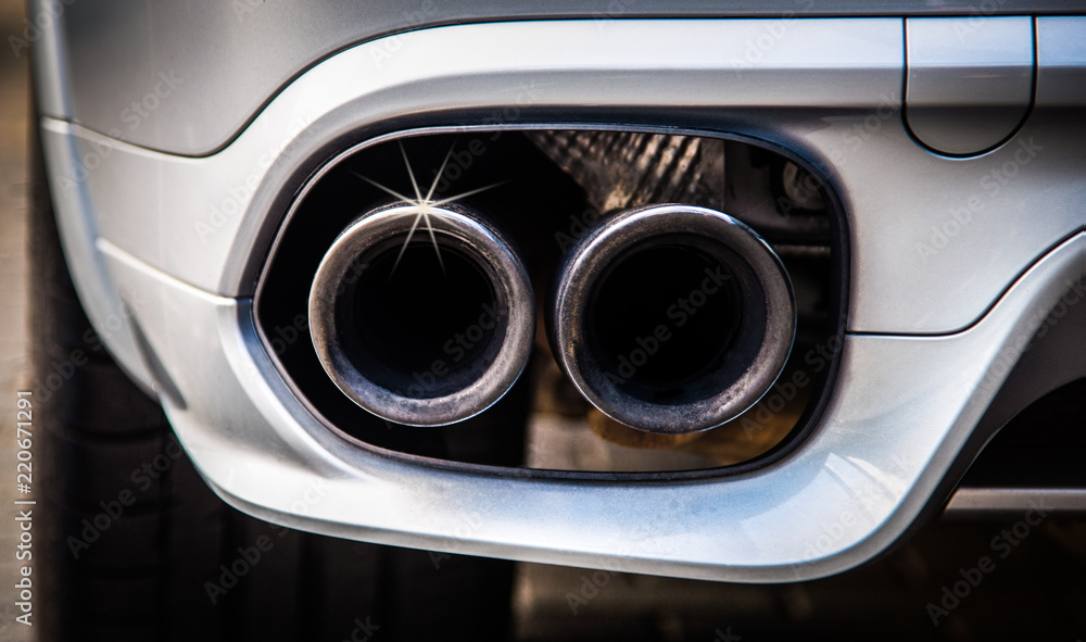 dual exhaust of a luxury car with power and turbo speed