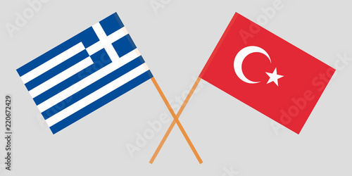 Greece and Turkey. Crossed Greek and Turkish flags. Official colors. Correct proportion. Vector