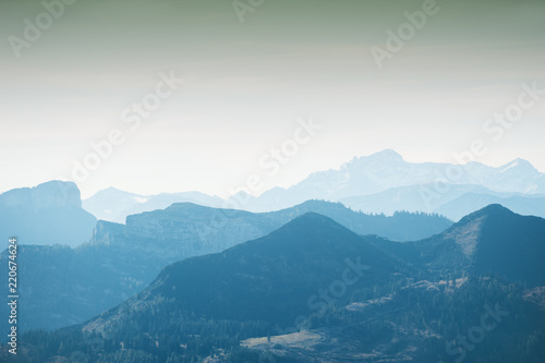 Mountains in foggy morning. Beautiful landscape in Austrian Alps.