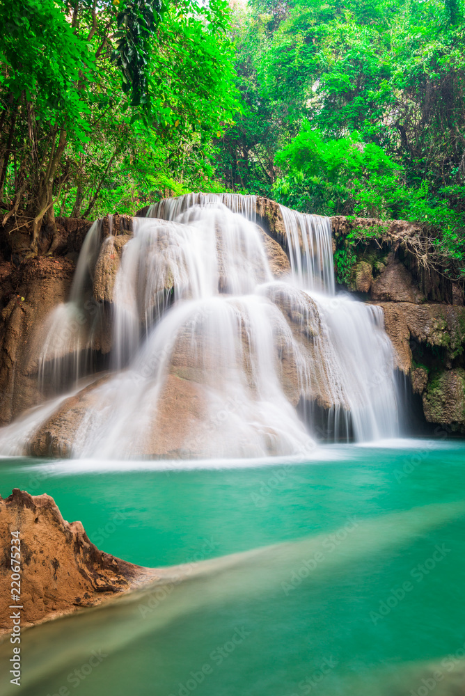Beautiful waterfall in the deep forest in Thailand
