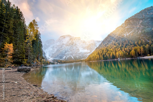 Amazing magical fairy autumn landscapeon the lake at sunrise on Fanes-Sennes-Braies natural park in the Dolomites in South Tyrol, Alps, Italy, Europe. photo