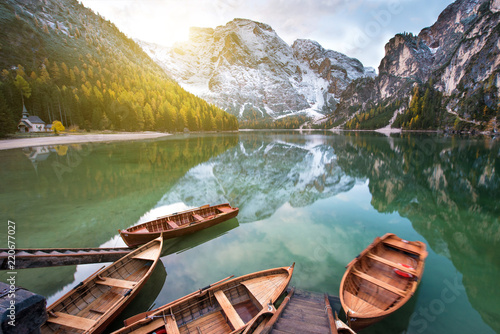 Magical beautiful fairy autumn landscape with boats on the lake on Fanes-Sennes-Braies natural park in the Dolomites in South Tyrol, Alps, Italy, Europe. (holiday, inner peace, harmony - concept) © anko_ter