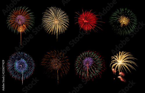 Colorful eight fireworks isolated on black background