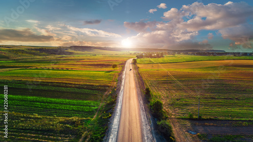 Aerial shot of car on the road from drone point of view