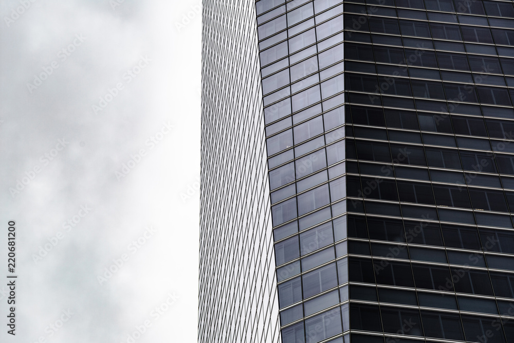 Glass skyscraper in financial district of Madrid