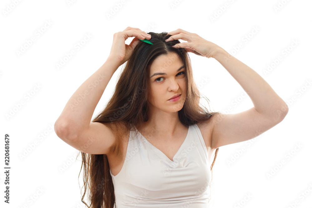 Young woman with problem hair. White background Young woman with problem hair. White background