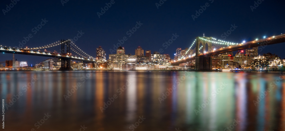 Brooklyn and Manhattan Bridge with Skyline at night