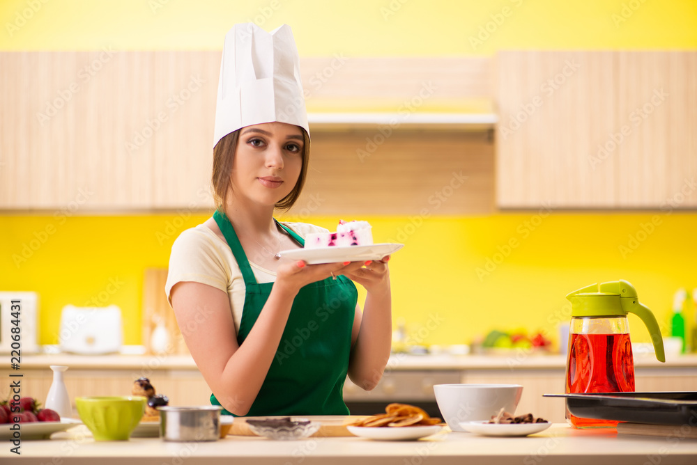 Young cook cooking cakes in the kitchen Young cook cooking cakes in the kitchen