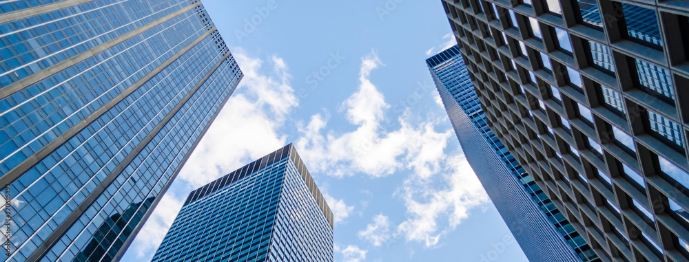 Bottom view of skyscrapers in Manhattan, New York, USA - obrazy, fototapety, plakaty 