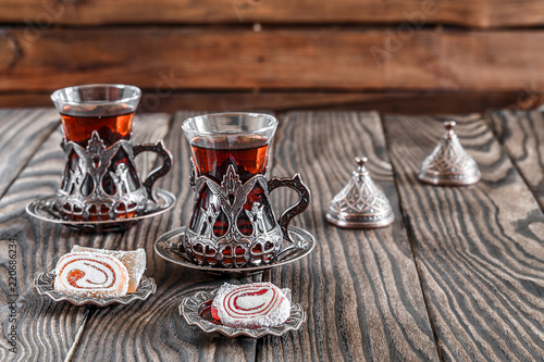 Fragrant Turkish tea and Turkish sweets in national dishes