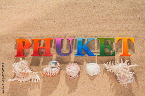The name of the word Phuket in colorful color on the beach