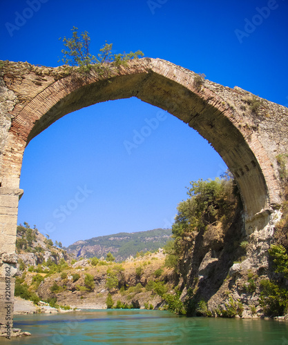 Panorama view to old ruined bridge over Dalaman river, Turkey
