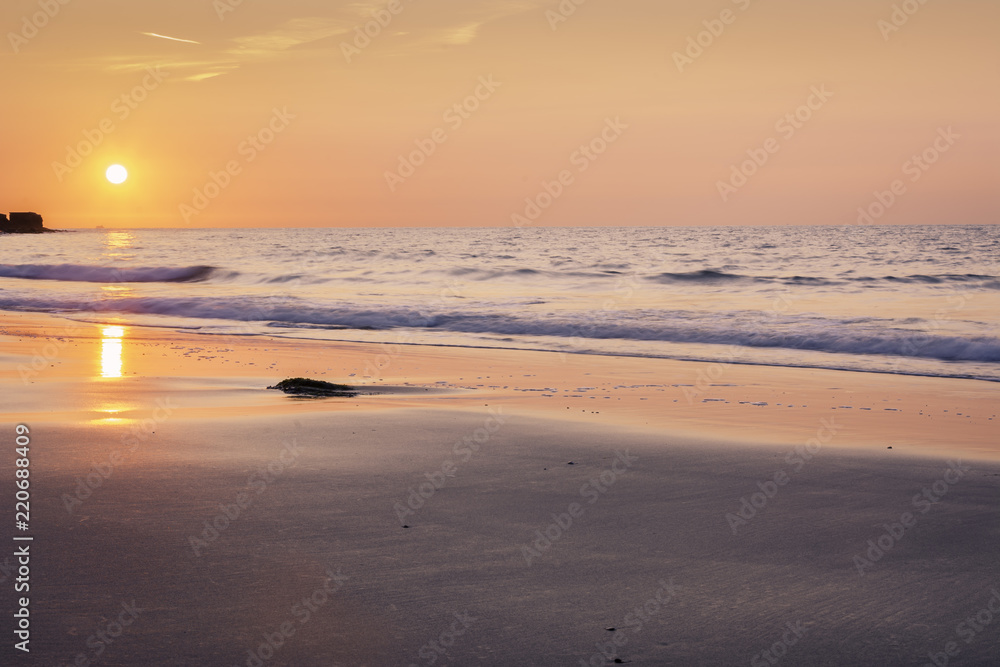 Folkestone sand beach at sunrise.