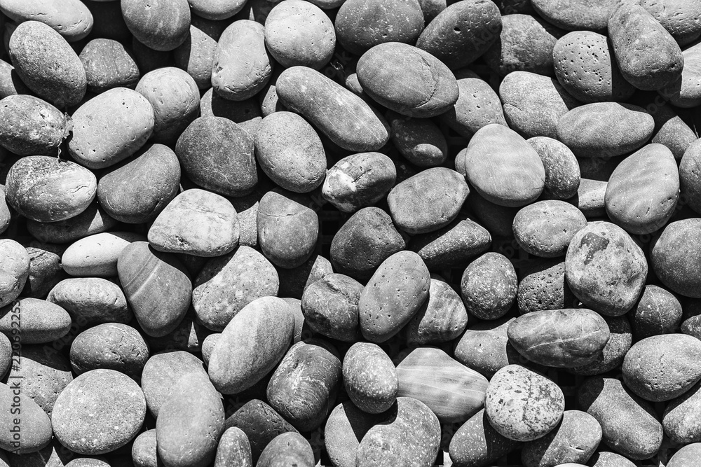 Smooth river stones under water in a stream Smooth river stones under water in a stream