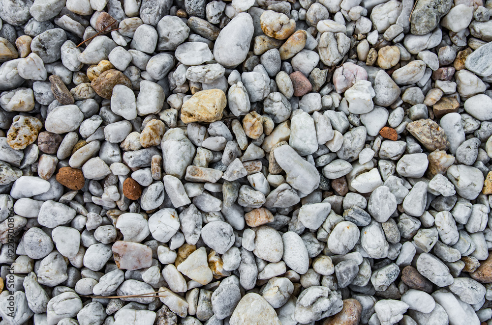 Grey pebbles background Grey pebbles background