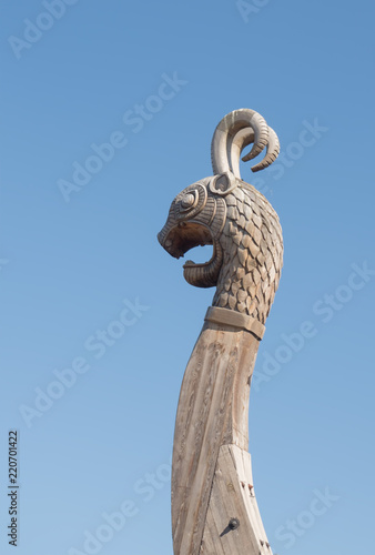 Wooden dragon figure on the nose of the Viking ship