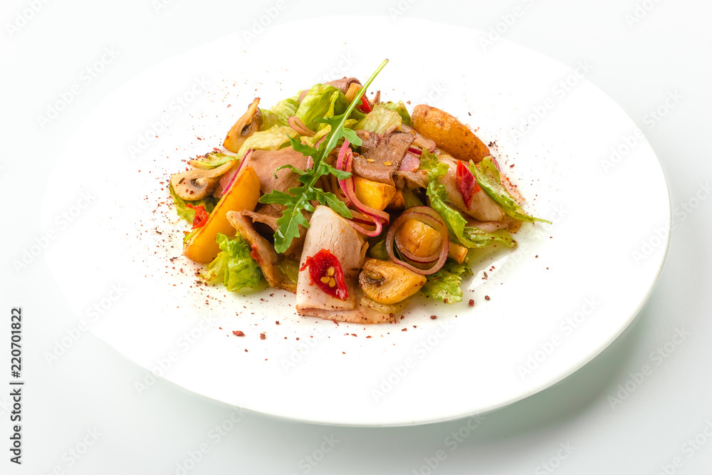 Meat salad with roast beef, mushrooms, potatoes, onions, mix of salad, spices, isolated on white background. Close-up Meat salad with roast beef, mushrooms, potatoes, onions, mix of salad, spices, isolated on white background. Close-up