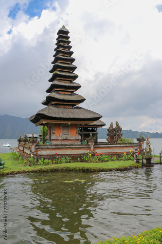 Temple in Bali Indonesia next to a mountain lake. Pura Ulun Danu Bratan, Bali. Hindu temple on Bratan lake.
