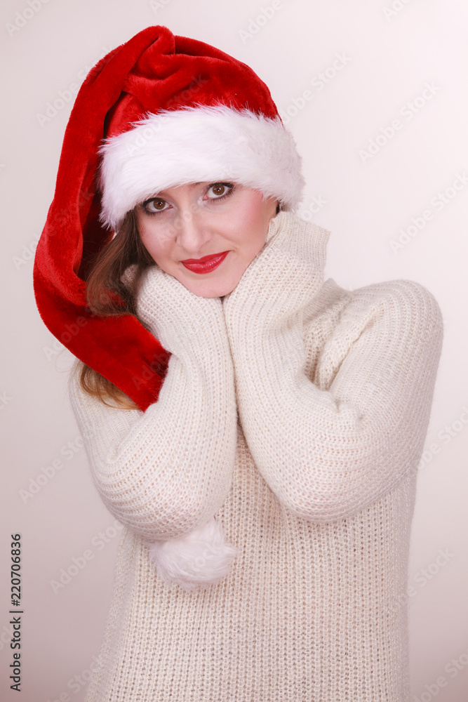 Woman wearing santa claus hat Woman wearing santa claus hat